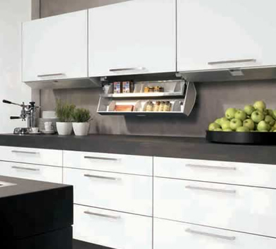 Flap under overhead cabinet